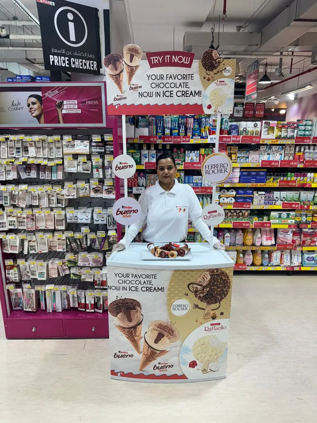 Promoter at a Ferrero or Kinder confectionery stand in a UAE supermarket (5)