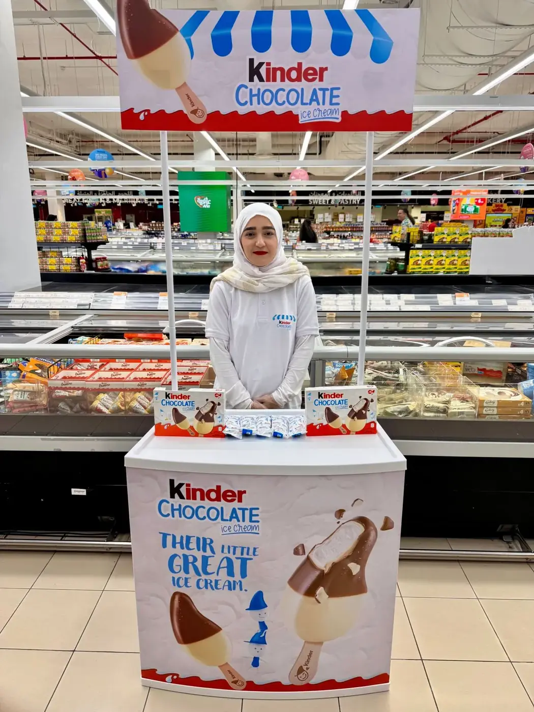 Promoter at a Ferrero or Kinder confectionery stand in a UAE supermarket (8)