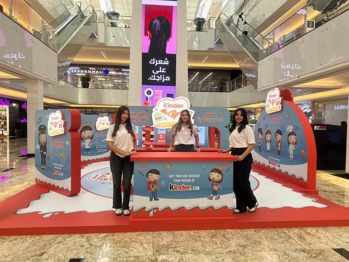 Promoter at a Ferrero or Kinder confectionery stand in a UAE supermarket (9)