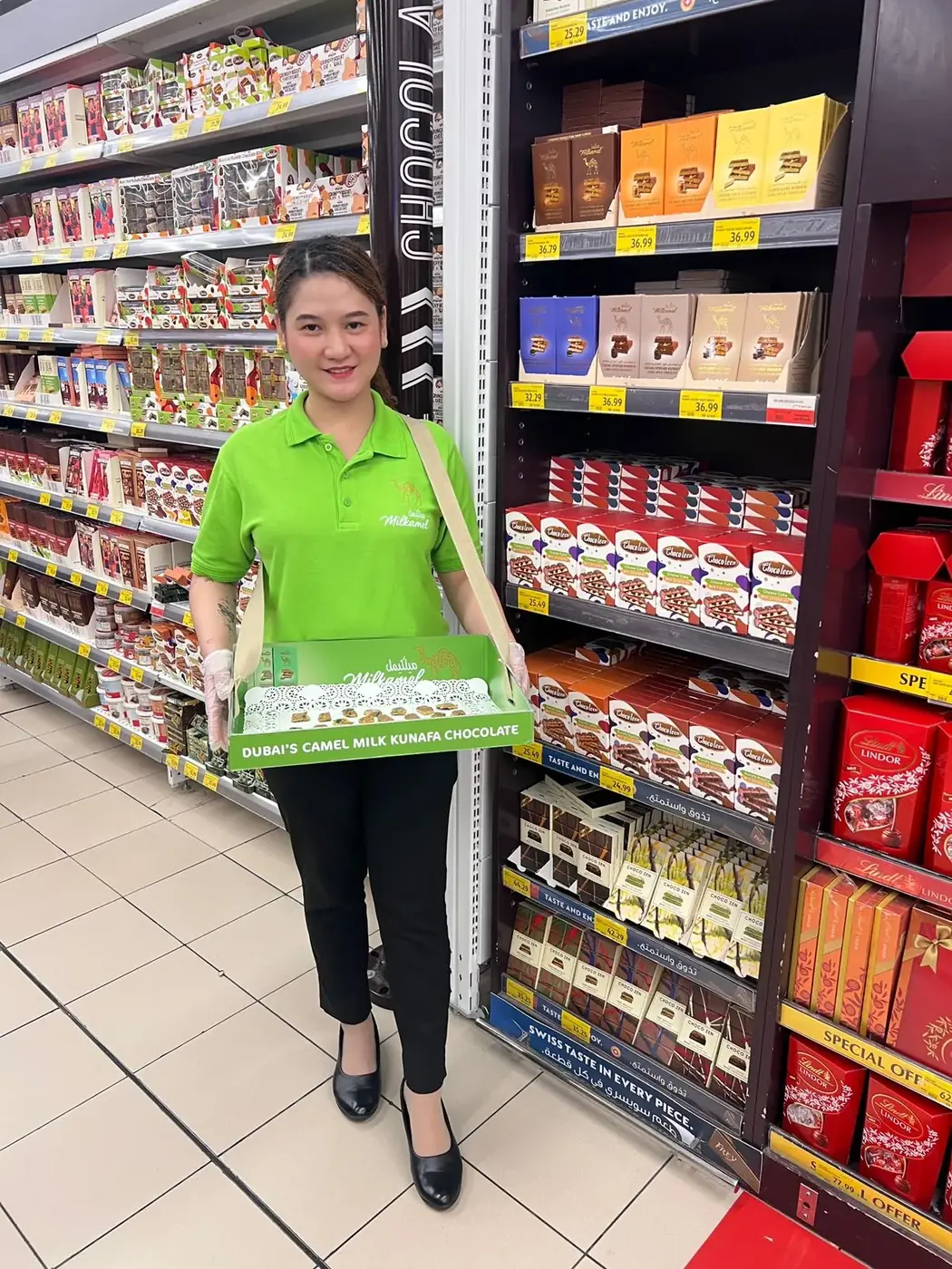 Milkamel promoter offering camel milk kunafa chocolate samples in a supermarket aisle (2)