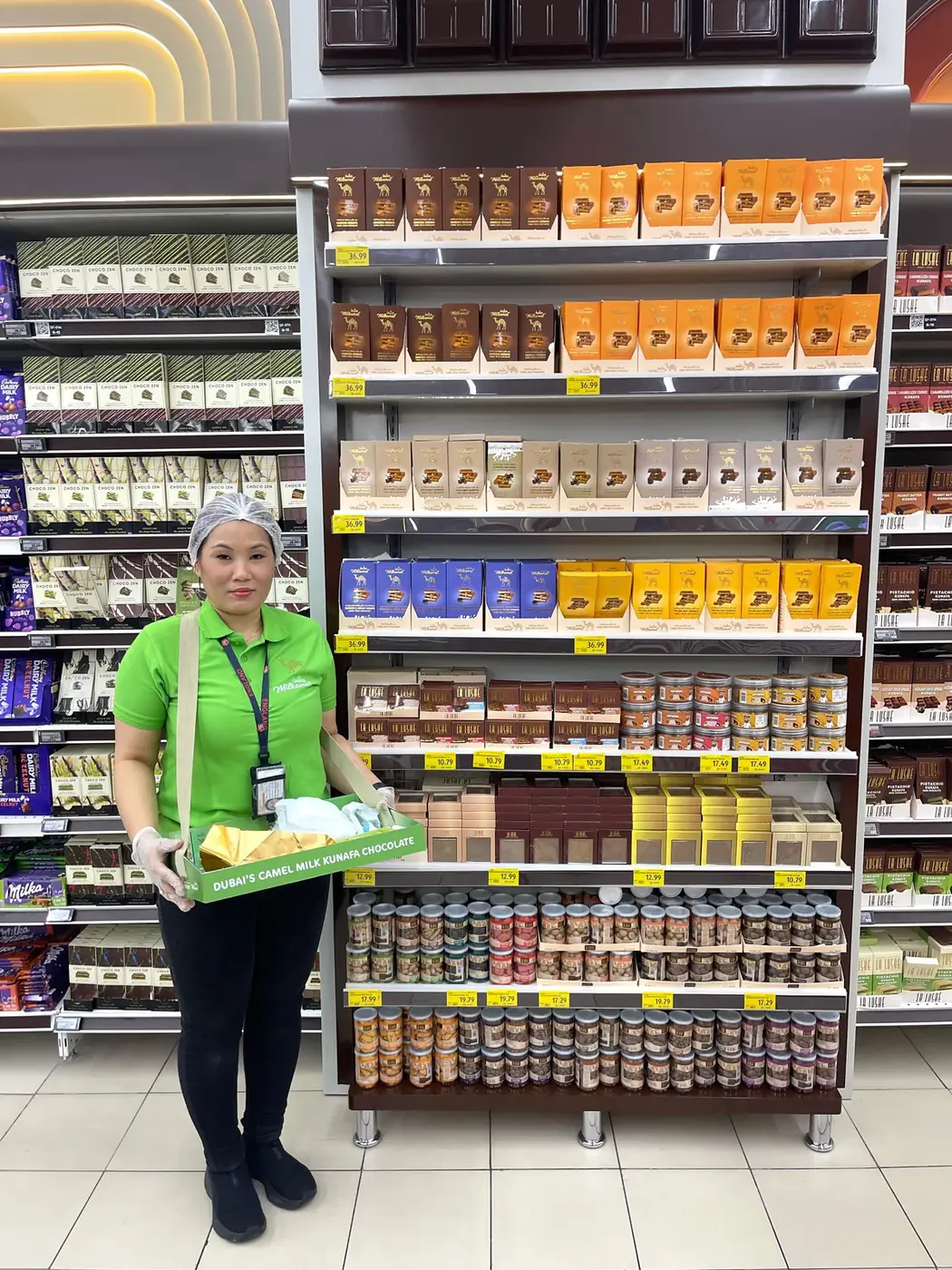 Milkamel promoter offering camel milk kunafa chocolate samples in a supermarket aisle (3)