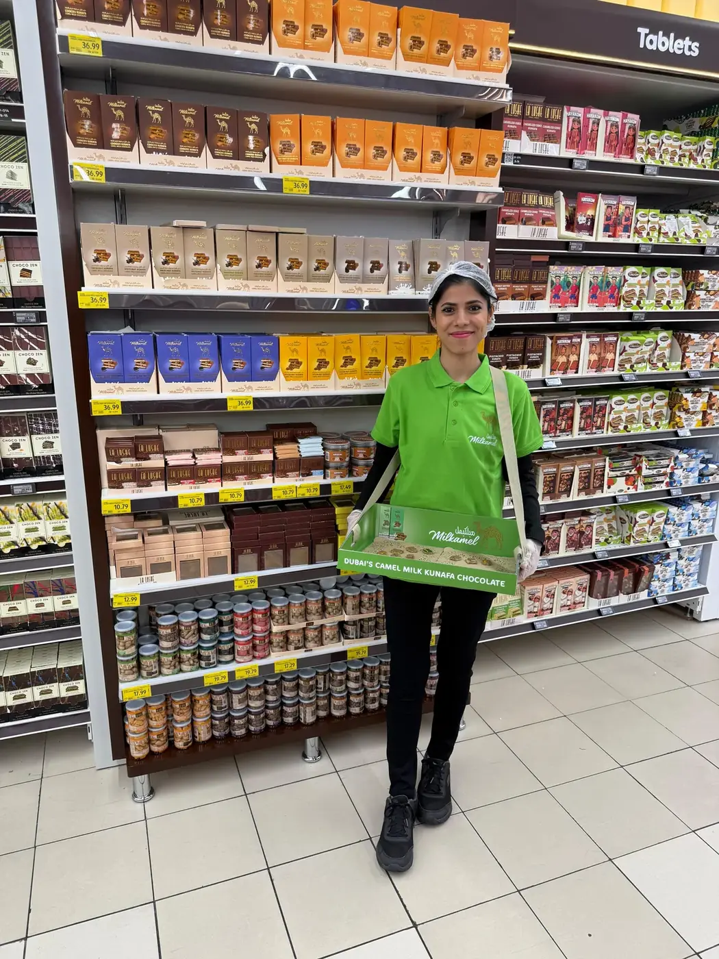 Milkamel promoter offering camel milk kunafa chocolate samples in a supermarket aisle (4)