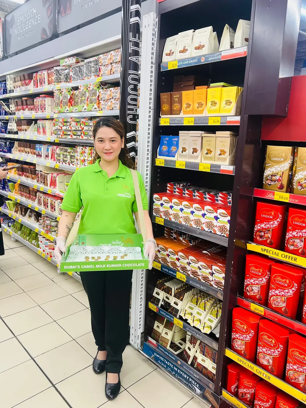 Milkamel promoter offering camel milk kunafa chocolate samples in a supermarket aisle (5)