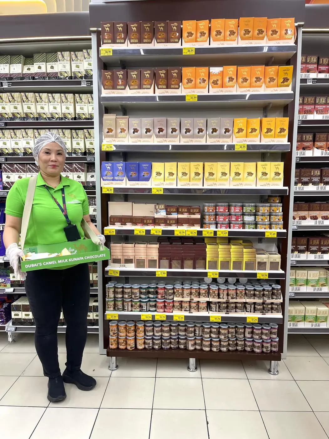 Milkamel promoter offering camel milk kunafa chocolate samples in a supermarket aisle (6)