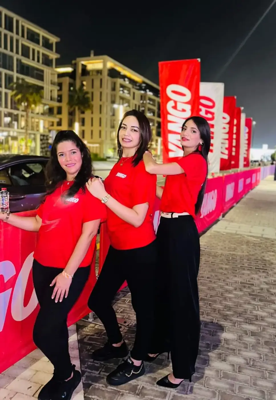 Branded promotional team at a night-time outdoor activation (2)
