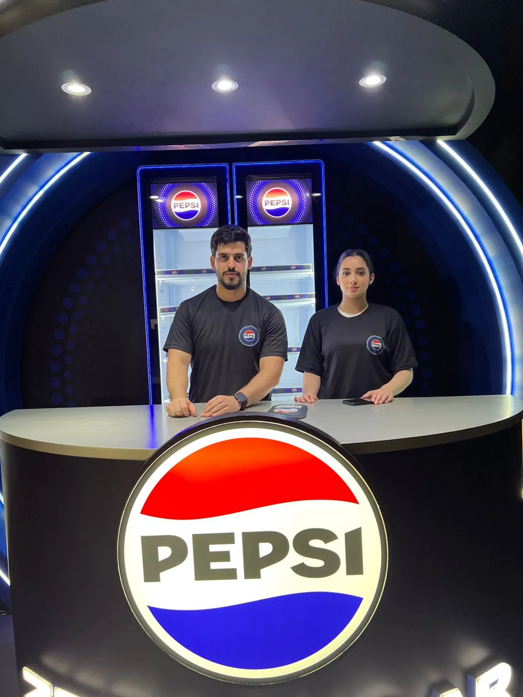Branded staff at the Pepsi Zero Sugar stand at an outdoor event (2)