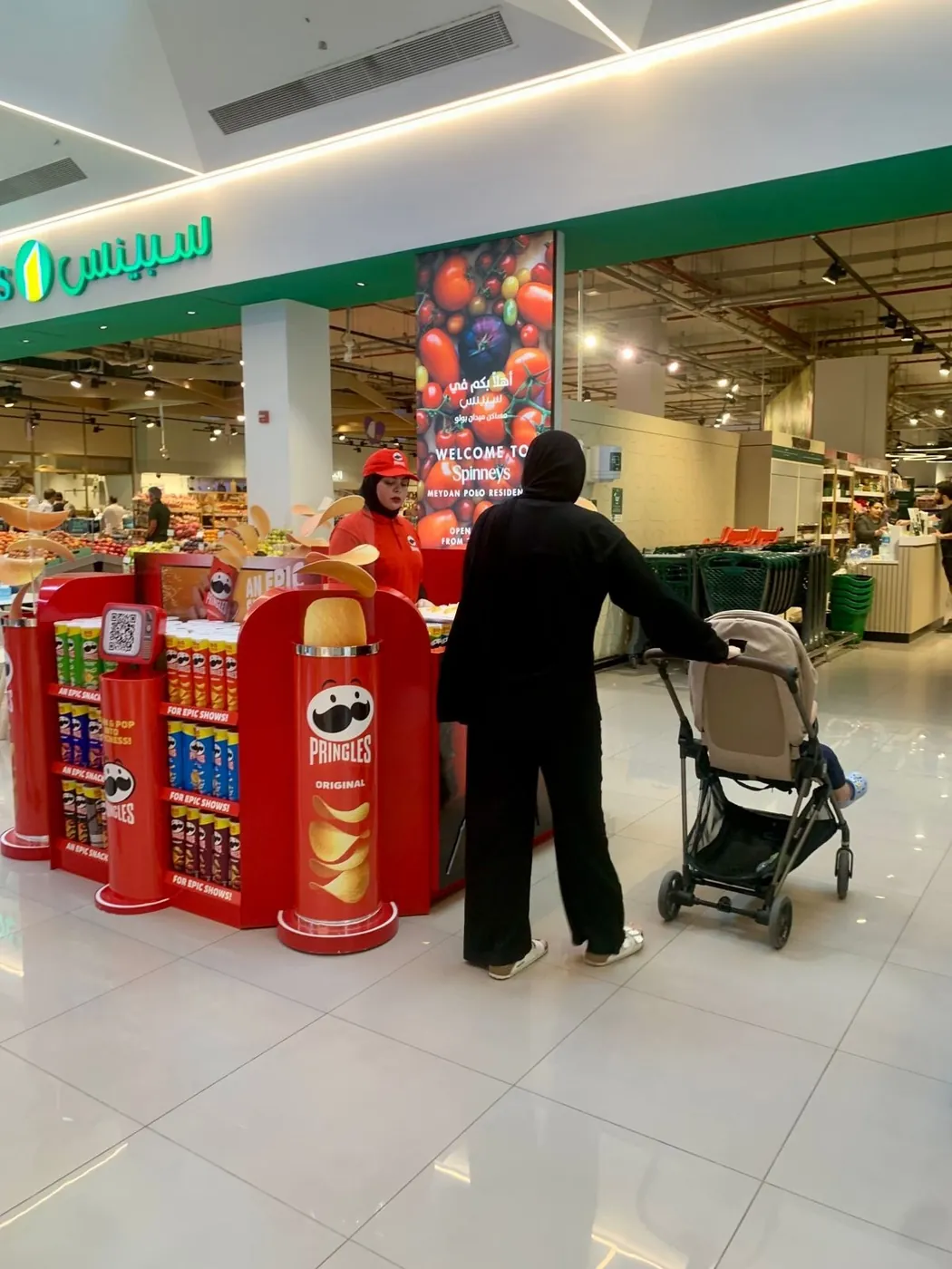 Pringles promoter at a branded stand with the mascot (5)